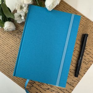 Caderno A5 (médio) Quadriculado 150 Folhas de 90g